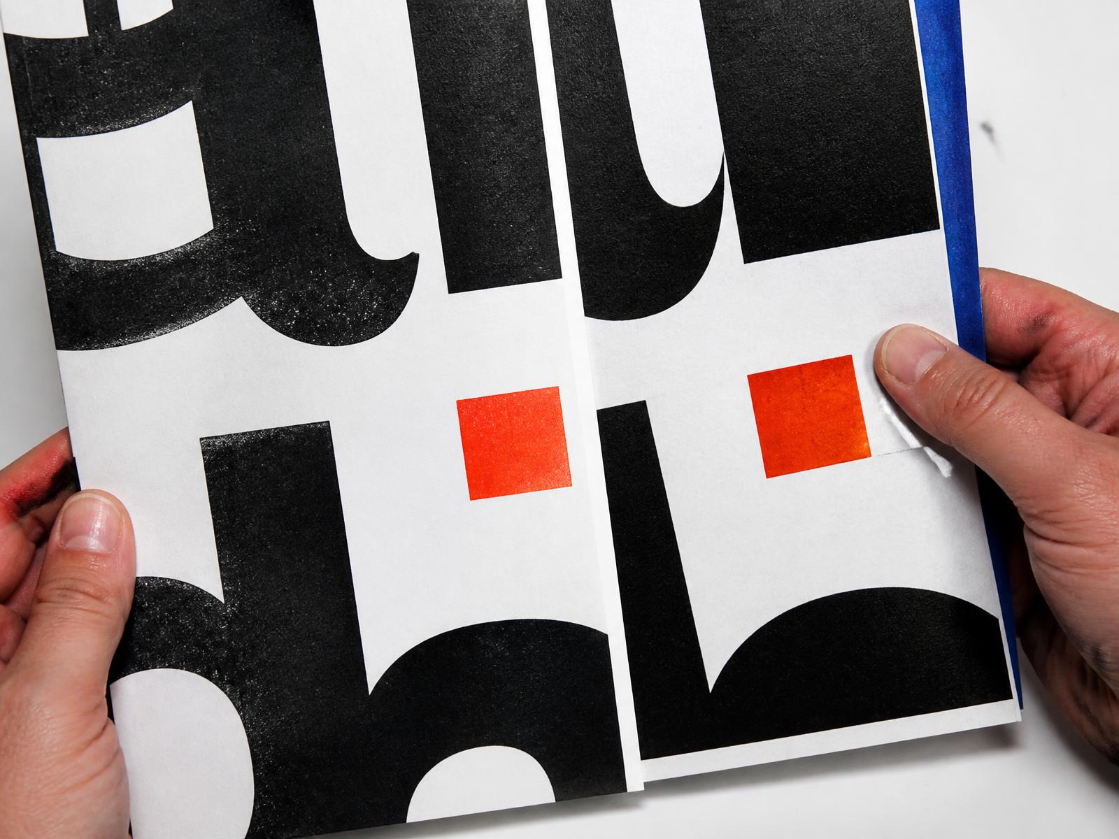 Two printed identity routes compared closely side by side, one marked as the chosen direction